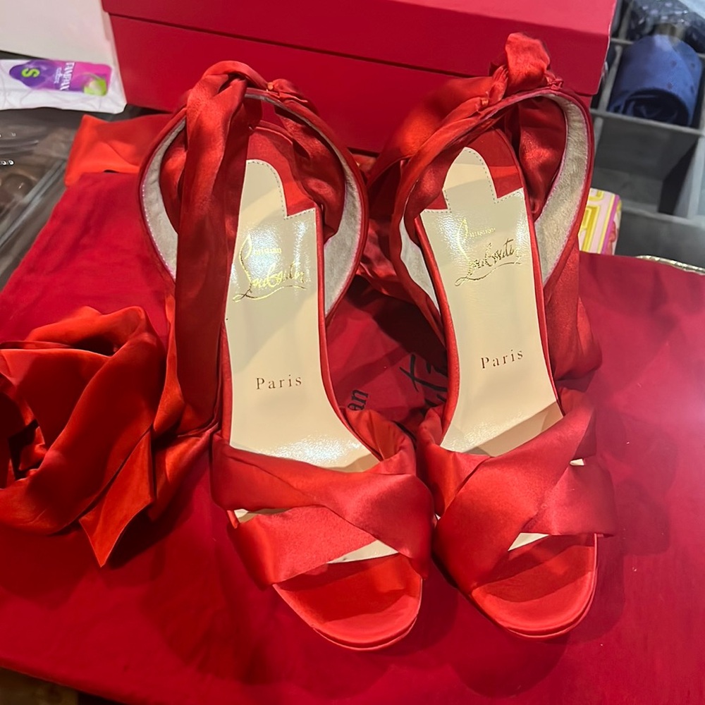 Christian louboutin ballerina style wrapped around the leg.